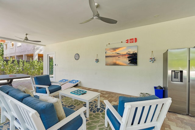 view of patio with an outdoor hangout area and ceiling fan