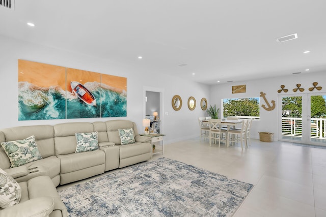 living room with light tile patterned floors