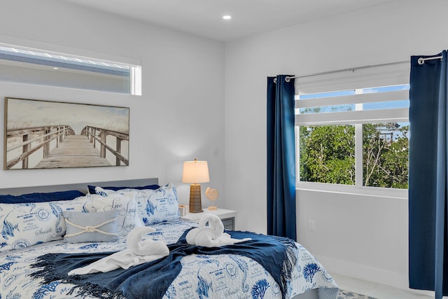 bedroom featuring multiple windows