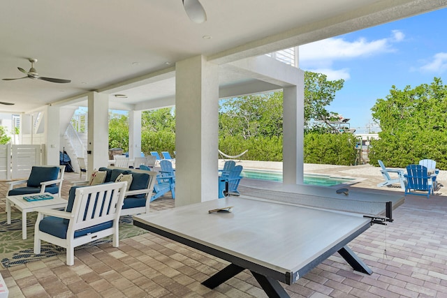 view of patio featuring ceiling fan