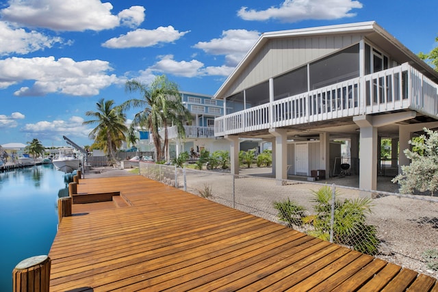 rear view of house with a water view