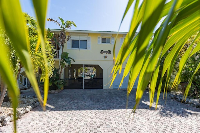 exterior space with a carport