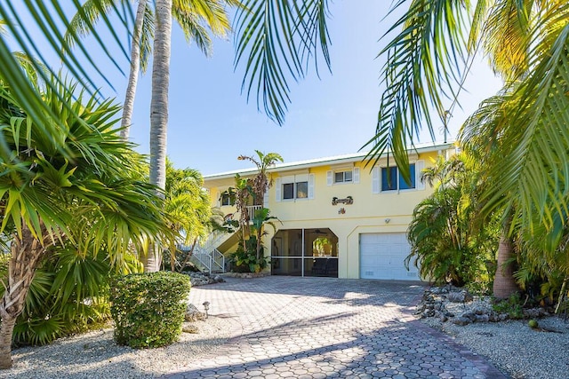 view of front of property featuring a garage