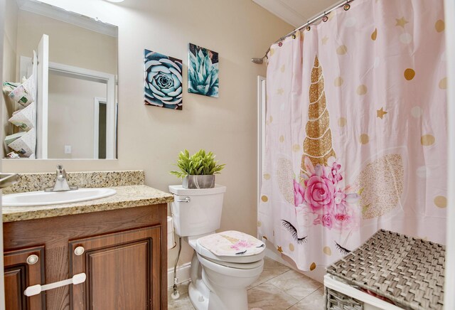 bathroom with vanity, a shower with curtain, tile patterned floors, and toilet