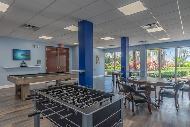 recreation room with hardwood / wood-style flooring, a drop ceiling, and billiards