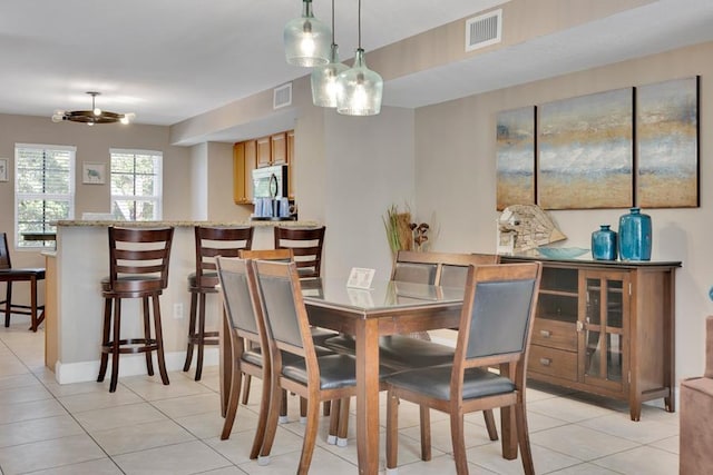 view of tiled dining room