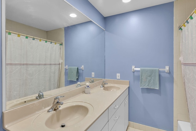 260 3rd St, Key Colony, FL 33051 - full bathroom with double vanity and a shower with shower curtain