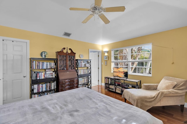 bedroom with hardwood / wood-style floors