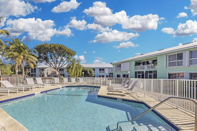 view of swimming pool with a patio