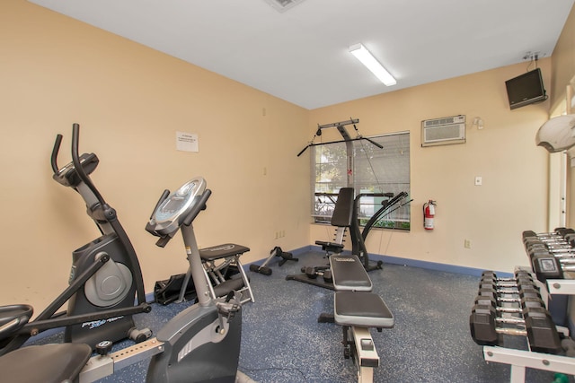 workout area with a wall unit AC