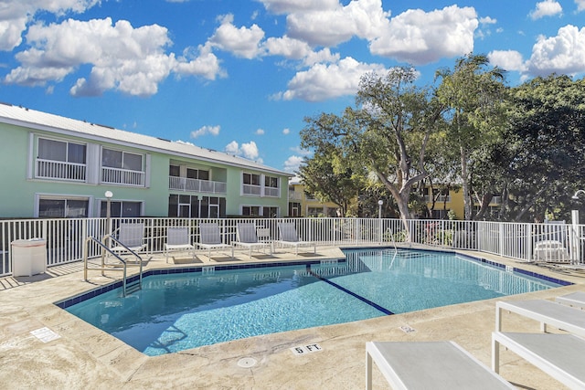 view of pool featuring a patio area