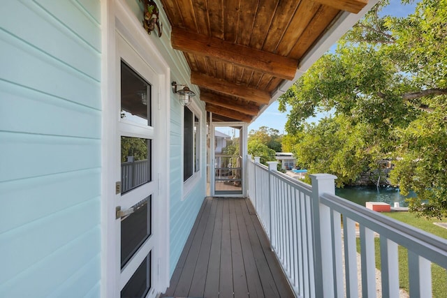 back of property featuring a carport and central air condition unit