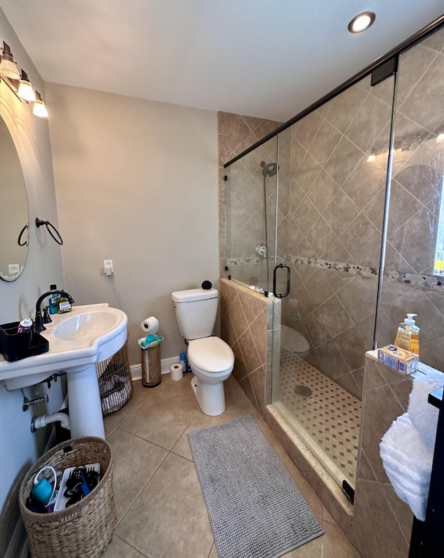 397 Balido St, Key West, FL 33040 - bathroom featuring a stall shower, toilet, tile patterned floors, and recessed lighting
