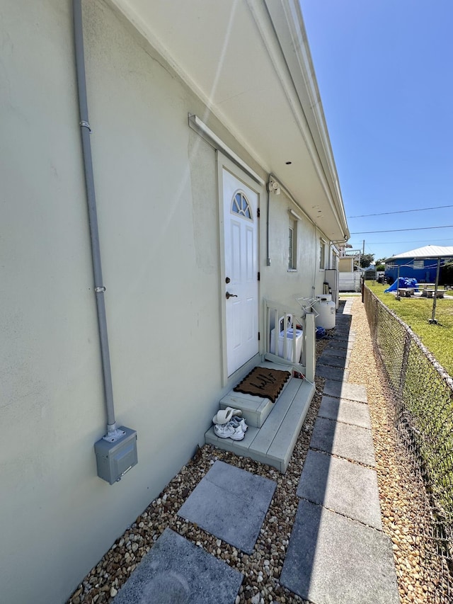 397 Balido St, Key West, FL 33040 - entrance to property with stucco siding and fence