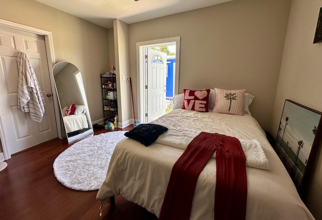 397 Balido St, Key West, FL 33040 - bedroom with wood finished floors and baseboards
