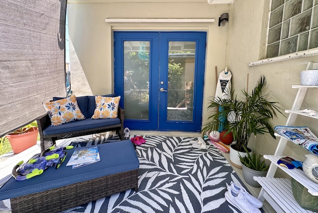 397 Balido St, Key West, FL 33040 - view of exterior entry featuring french doors and stucco siding