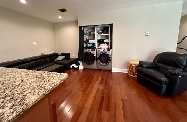 397 Balido St, Key West, FL 33040 - living area featuring washing machine and dryer, dark wood finished floors, baseboards, and recessed lighting