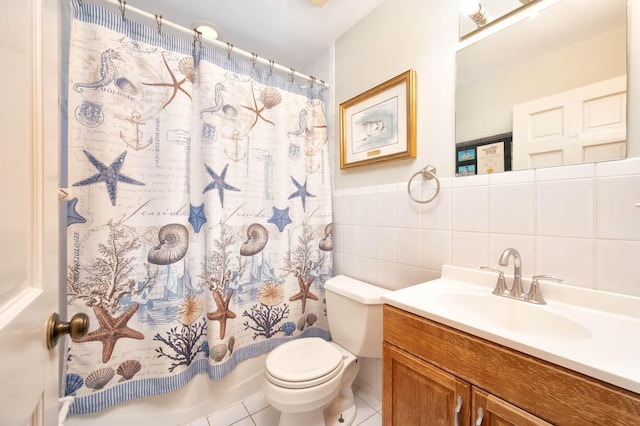 full bathroom featuring toilet, tile walls, vanity, shower / bath combo, and tile patterned flooring