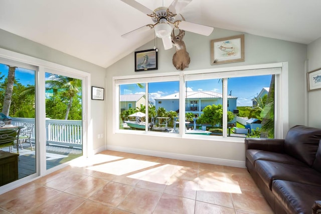 sunroom with vaulted ceiling and ceiling fan