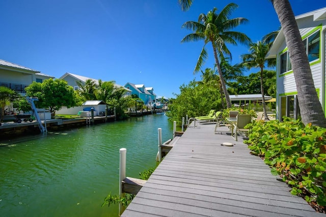 dock area with a water view