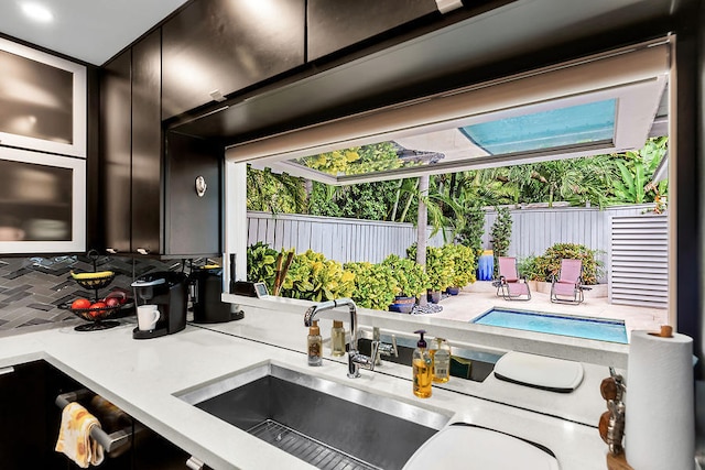 kitchen with sink and backsplash