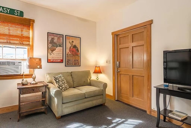 living room featuring carpet floors and cooling unit