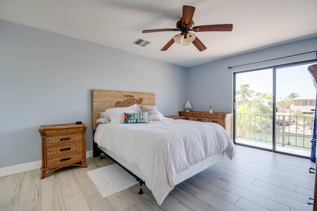 bedroom featuring ceiling fan, access to exterior, and light hardwood / wood-style flooring