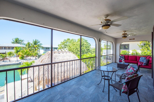 sunroom / solarium featuring a wealth of natural light