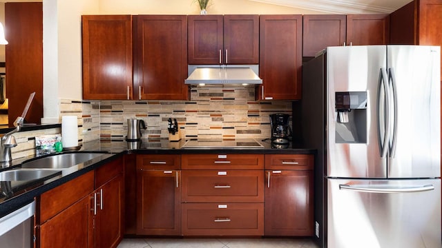 97501 Overseas Hwy Unit 809, Key Largo, FL 33037 - kitchen featuring stainless steel refrigerator with ice dispenser, exhaust hood, black electric cooktop, tasteful backsplash, and dark brown cabinets