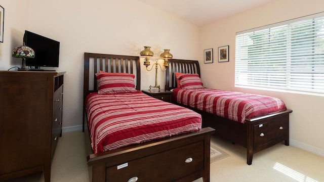 97501 Overseas Hwy Unit 809, Key Largo, FL 33037 - bedroom featuring light carpet and baseboards