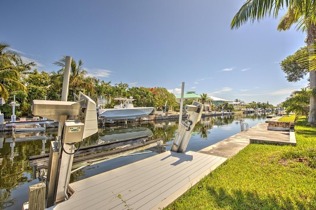 22865 Redfish Ln, Cudjoe, FL 33042 - dock area with boat lift and a water view