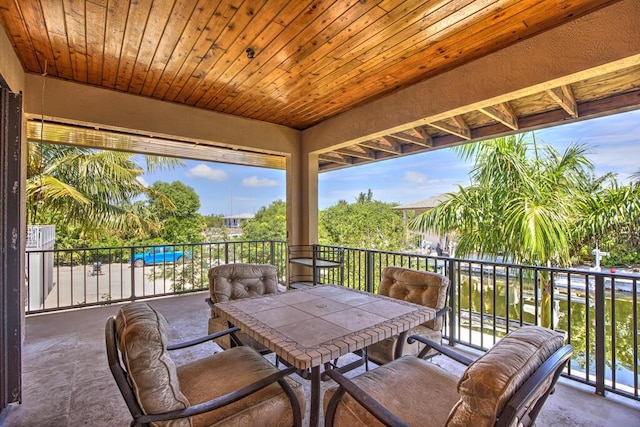 22865 Redfish Ln, Cudjoe, FL 33042 - view of patio featuring outdoor dining space and a balcony