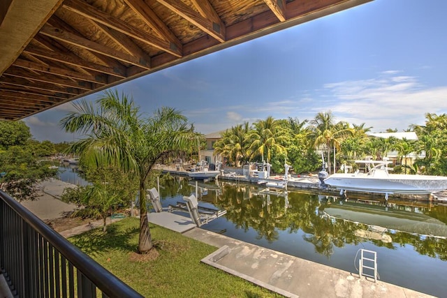 22865 Redfish Ln, Cudjoe, FL 33042 - dock with a water view and boat lift
