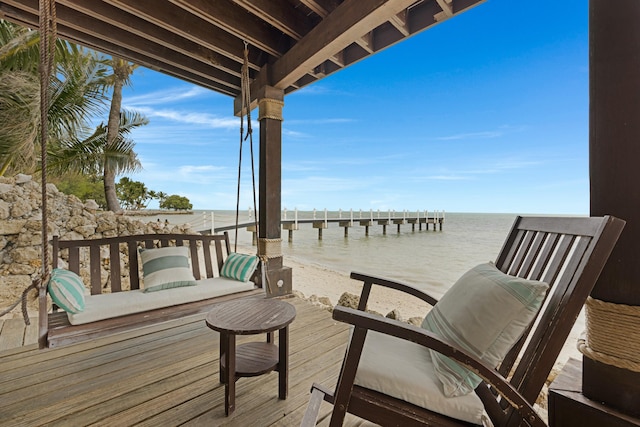 deck featuring a water view