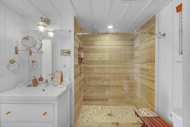 bathroom with vanity and an enclosed shower