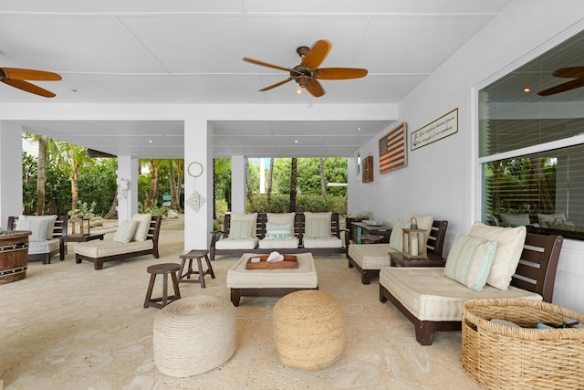 sunroom with ceiling fan