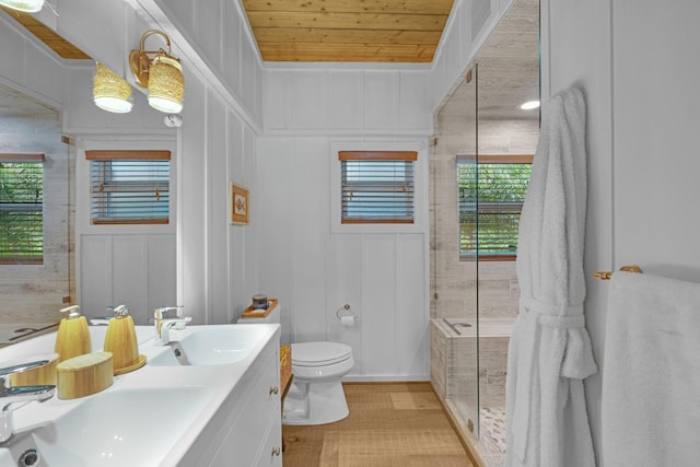 bathroom with a healthy amount of sunlight, toilet, a shower, and wooden ceiling