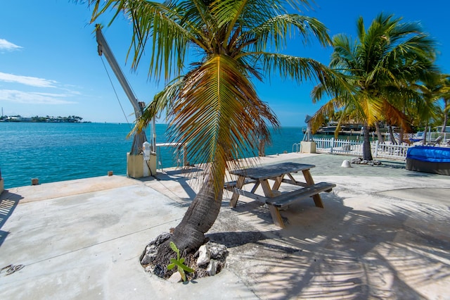 view of patio / terrace featuring a water view