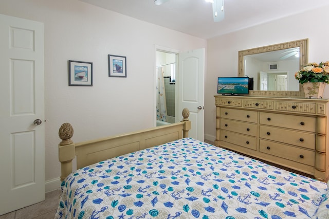 tiled bedroom with ceiling fan