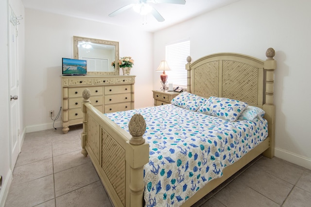 bedroom featuring light tile patterned floors and ceiling fan