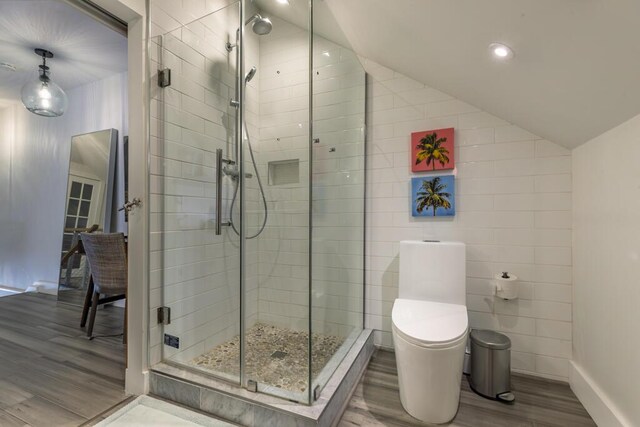 1014 Truman Ave Unit 3, Key West, FL 33040 - full bath with vaulted ceiling, recessed lighting, toilet, a shower stall, and wood finished floors