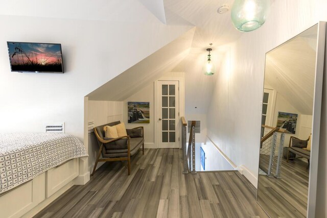 1014 Truman Ave Unit 3, Key West, FL 33040 - bedroom featuring baseboards, vaulted ceiling, and wood finished floors
