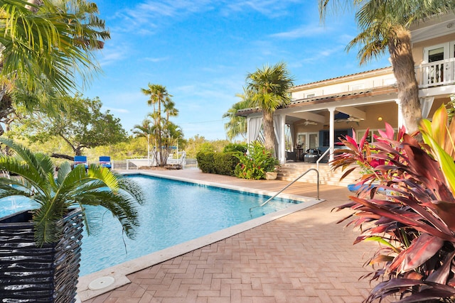3300 Riviera Dr, Key West, FL 33040 - outdoor pool with a ceiling fan, french doors, a patio, and fence