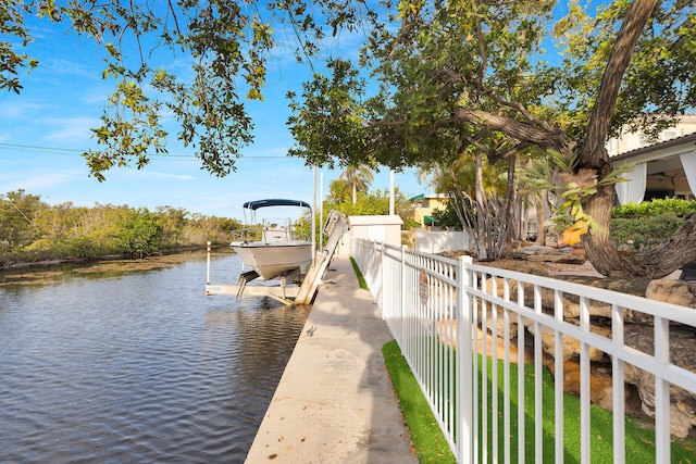 3300 Riviera Dr, Key West, FL 33040 - dock area with boat lift, a water view, and fence