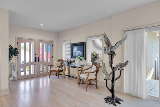 3300 Riviera Dr, Key West, FL 33040 - sitting room with light wood finished floors, recessed lighting, and baseboards