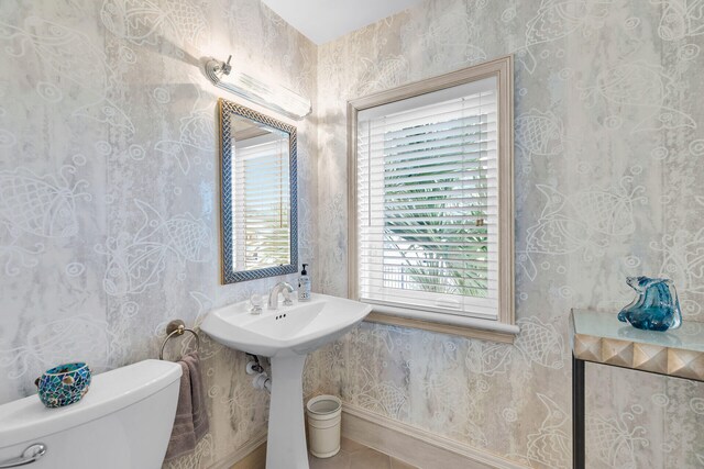 3300 Riviera Dr, Key West, FL 33040 - half bath with toilet, wallpapered walls, and baseboards