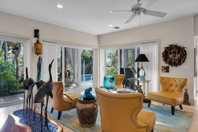 3300 Riviera Dr, Key West, FL 33040 - living area featuring a ceiling fan, recessed lighting, and wood finished floors