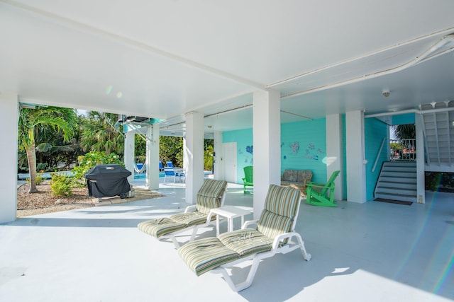 view of patio with a grill