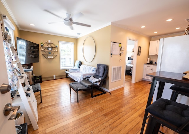 1124 Catherine St Unit 201, Key West, FL 33040 - living area with ceiling fan, crown molding, recessed lighting, light wood-style floors, and baseboards