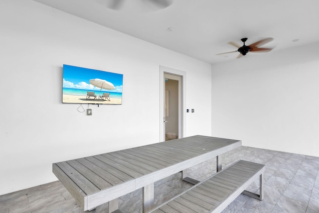 view of patio featuring ceiling fan